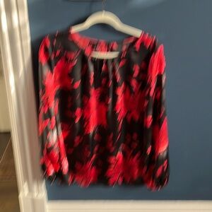 Talbots pullover top with front keyholel opening. Fits at hip washable .